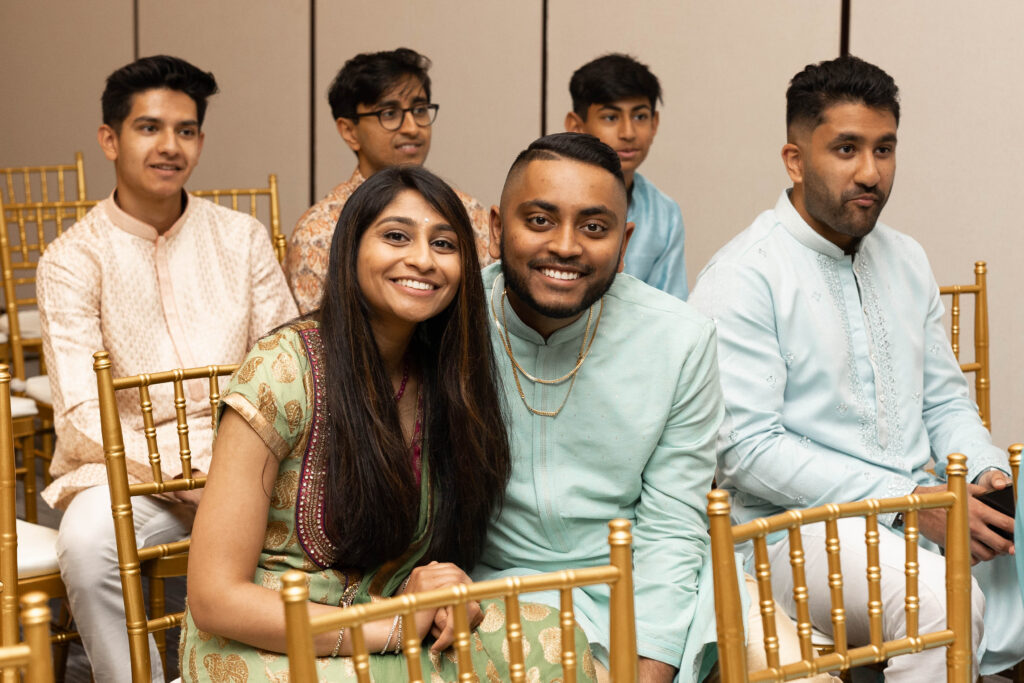 Smiling couple during Sangeet ceremony