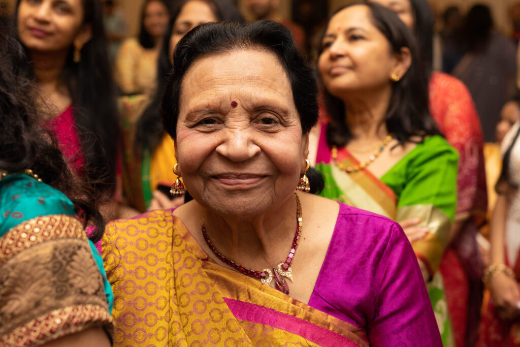 Smiling grandmother during Sangeet