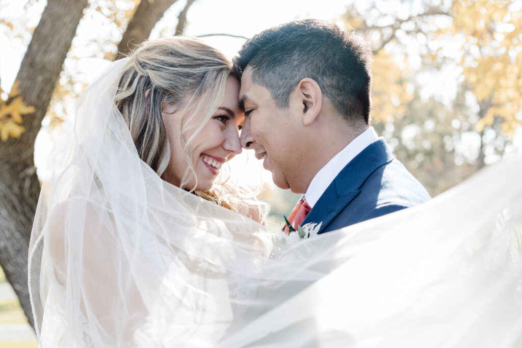 Bride and Groom Portraits with veil