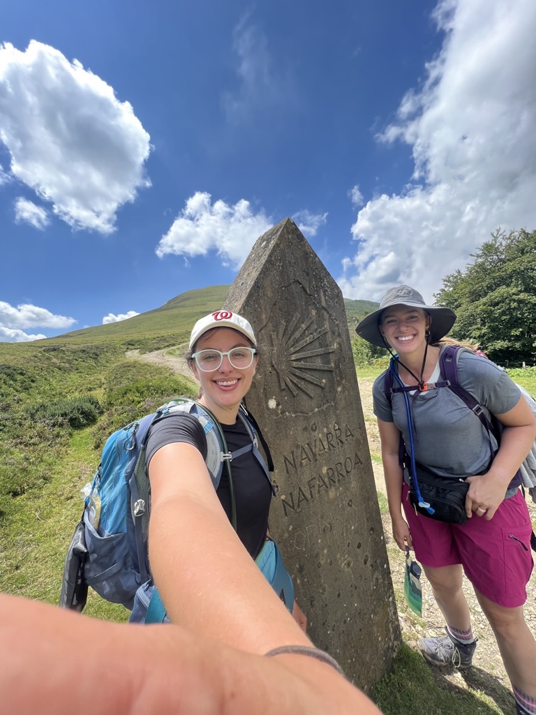 two friends on the spanish/french boarder while walking the camino de santiago